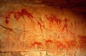Rupestre. Pittura con scena di battaglia nella zona del Tassili, in Algeria, di notevole importanza per l'arte rupestre.De Agostini Picture Library / E. Pagani Rupestre. Pittura con scena di battaglia nella zona del Tassili, in Algeria, di notevole importanza per l'arte rupestre.De Agostini Picture Library / E. Pagani