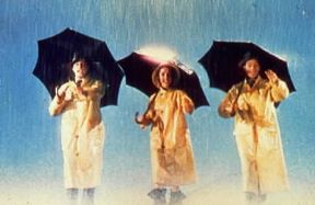 Gene Kelly. Una scena tratta da Cantando sotto la pioggia (1952), di cui è interprete e regista.De Agostini Picture Library Gene Kelly. Una scena tratta da Cantando sotto la pioggia (1952), di cui è interprete e regista.De Agostini Picture Library