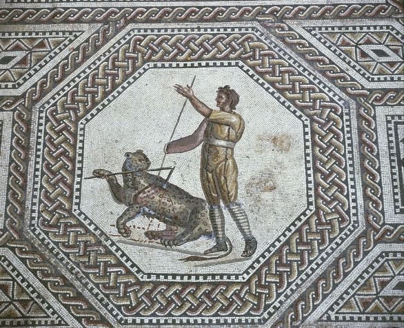 Gladiatori, mosaico in Germania Germania, dintorni di Treviri. Nennig, villa romana. Mosaico pavimentale con medaglioni con scene di combattimento tra gladiatori nell'arena di Augusta Treverorum. Particolare: pantera e lanciatore di giavellotto. II-III secolo. Gladiatori, mosaico in Germania Germania, dintorni di Treviri. Nennig, villa romana. Mosaico pavimentale con medaglioni con scene di combattimento tra gladiatori nell'arena di Augusta Treverorum. Particolare: pantera e lanciatore di giavellotto. II-III secolo.
