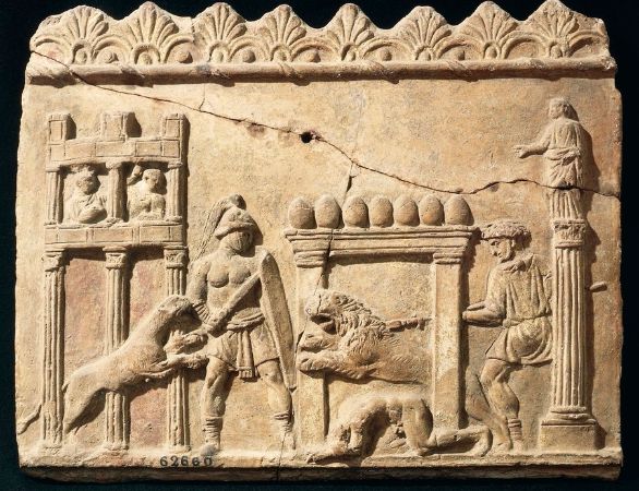 Gladiatori, scena di combattimento su terracotta Civiltà romana, I secolo a.C. Rilievo in terracotta raffigurante un combattimento di leoni e gladiatori nel circo. Gladiatori, scena di combattimento su terracotta Civiltà romana, I secolo a.C. Rilievo in terracotta raffigurante un combattimento di leoni e gladiatori nel circo.