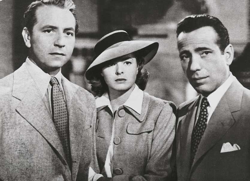 Humphrey Bogart, Ingrid Bergman e Paul Henreid in 'Casablanca' Humphrey Bogart, Ingrid Bergman e Paul Henreid in una scena del film Casablanca, del 1942 con la regia di Michael Curtis.
De Agostini Picture Library